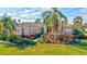 Beautiful home exterior with lush landscaping and a welcoming entrance at 210 166Th Ne St, Bradenton, FL 34212