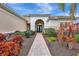 Brick walkway leading to a beautiful home entrance at 210 166Th Ne St, Bradenton, FL 34212