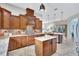 Bright kitchen with granite countertops and an island at 210 166Th Ne St, Bradenton, FL 34212