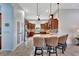 Kitchen features granite counters, island with seating, and stainless steel appliances at 210 166Th Ne St, Bradenton, FL 34212