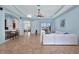 Spacious living room with light blue walls and white sectional at 210 166Th Ne St, Bradenton, FL 34212