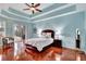 Main bedroom with hardwood floors, pool view, and ample space at 210 166Th Ne St, Bradenton, FL 34212