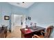 Home office with desk, brown leather chair, and built-in shelving at 210 166Th Ne St, Bradenton, FL 34212