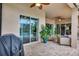 Covered patio with seating and grill at 210 166Th Ne St, Bradenton, FL 34212