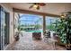 Relaxing screened-in patio with pool and lake view at 210 166Th Ne St, Bradenton, FL 34212