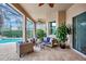 Spacious patio area with comfortable seating and pool access at 210 166Th Ne St, Bradenton, FL 34212