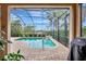 Relaxing screened pool and patio area at 210 166Th Ne St, Bradenton, FL 34212