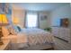 Spacious bedroom with large windows and dresser at 3223 Beneva Rd # 201, Sarasota, FL 34232