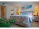 Bright bedroom with a comfortable bed and plenty of closet space at 3223 Beneva Rd # 201, Sarasota, FL 34232