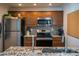 Modern kitchen with stainless steel appliances at 3223 Beneva Rd # 201, Sarasota, FL 34232