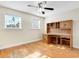 Bright bedroom with hardwood floors and built-in desk at 3523 52Nd W Ave, Bradenton, FL 34210