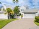 Gray siding townhome with a two-car garage and manicured lawn at 3523 52Nd W Ave, Bradenton, FL 34210