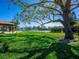Beautifully landscaped grounds with mature trees and community amenities at 3523 52Nd W Ave, Bradenton, FL 34210