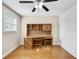 Bright home office features built-in desk and hardwood floors at 3523 52Nd W Ave, Bradenton, FL 34210