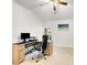 Home office with large desk, printer, and tile floor at 3523 52Nd W Ave # 289, Bradenton, FL 34210