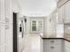 Modern kitchen with granite countertops and stainless steel appliances at 3523 52Nd W Ave, Bradenton, FL 34210