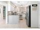 Modern kitchen with granite countertops and white cabinets at 3523 52Nd W Ave, Bradenton, FL 34210