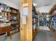 Community library with shelves stocked with books and puzzles at 3523 52Nd W Ave, Bradenton, FL 34210