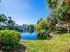 Scenic pond view with lush landscaping and homes at 3523 52Nd W Ave, Bradenton, FL 34210