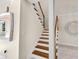 Elegant wooden staircase with white railings at 3523 52Nd W Ave, Bradenton, FL 34210