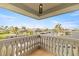 Private balcony with water views and ornate balustrade at 3607 Darin Dr, Punta Gorda, FL 33950