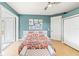Bedroom with a comfortable sitting area and access to a patio at 3607 Darin Dr, Punta Gorda, FL 33950