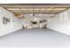 Spacious garage with overhead storage and epoxy floor at 3607 Darin Dr, Punta Gorda, FL 33950