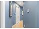 A hallway with light walls and tile flooring at 3607 Darin Dr, Punta Gorda, FL 33950