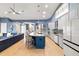 Modern kitchen with a large island, stainless steel appliances, and ample counter space at 3607 Darin Dr, Punta Gorda, FL 33950