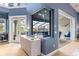 Living room with a built-in cabinet, and access to the pool and patio at 3607 Darin Dr, Punta Gorda, FL 33950
