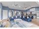 Spacious living room with sectional sofa and large TV at 3607 Darin Dr, Punta Gorda, FL 33950