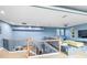 Open loft with ample natural light and a view of the lower level at 3607 Darin Dr, Punta Gorda, FL 33950