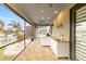 Screened patio with outdoor kitchen and granite countertops at 3607 Darin Dr, Punta Gorda, FL 33950