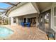 Spacious patio with pool, spa, and seating area at 3607 Darin Dr, Punta Gorda, FL 33950