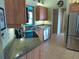 Kitchen with granite countertops and stainless steel dishwasher at 4220 Pinebrook Cir # 12, Bradenton, FL 34209