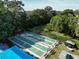 Three shuffleboard courts nestled in a lush green setting at 425 30Th W Ave # C102, Bradenton, FL 34205