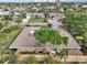 Aerial view of house, backyard, and wooden fence at 430 Beach Park Blvd, Venice, FL 34285