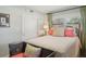 Cozy bedroom featuring a full-size bed and decorative pillows at 430 Beach Park Blvd, Venice, FL 34285