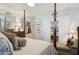 Serene bedroom with a comfortable sitting area and large windows at 430 Beach Park Blvd, Venice, FL 34285