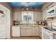 Kitchen with granite countertops and white appliances at 430 Beach Park Blvd, Venice, FL 34285