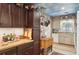 Bright kitchen boasts ample cabinetry, granite counters, and a butcher block island at 430 Beach Park Blvd, Venice, FL 34285