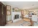 Spacious living room with fireplace and neutral color scheme at 430 Beach Park Blvd, Venice, FL 34285