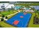 Aerial view of community amenities including pool, playground, and basketball court at 4810 Sparkling Sea Ln, Bradenton, FL 34211
