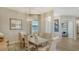 Elegant dining room featuring a rustic wood table at 4810 Sparkling Sea Ln, Bradenton, FL 34211