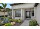 Front entrance with stone walkway and professionally designed landscaping at 4810 Sparkling Sea Ln, Bradenton, FL 34211