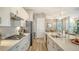 Modern kitchen with stainless steel appliances and an island at 4810 Sparkling Sea Ln, Bradenton, FL 34211