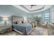 Serene main bedroom with plush bedding and en-suite bath at 4810 Sparkling Sea Ln, Bradenton, FL 34211