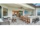 Outdoor patio with seating area, grill, and view of living room at 4810 Sparkling Sea Ln, Bradenton, FL 34211