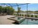 Spa and refreshing pool with screened enclosure at 4810 Sparkling Sea Ln, Bradenton, FL 34211