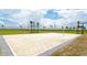 Beach volleyball court with a net at 4810 Sparkling Sea Ln, Bradenton, FL 34211